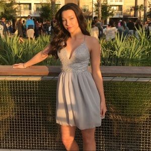 A silver dress worn once